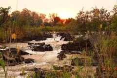 Namibia, Sonnenuntergang an den Popa Falls
